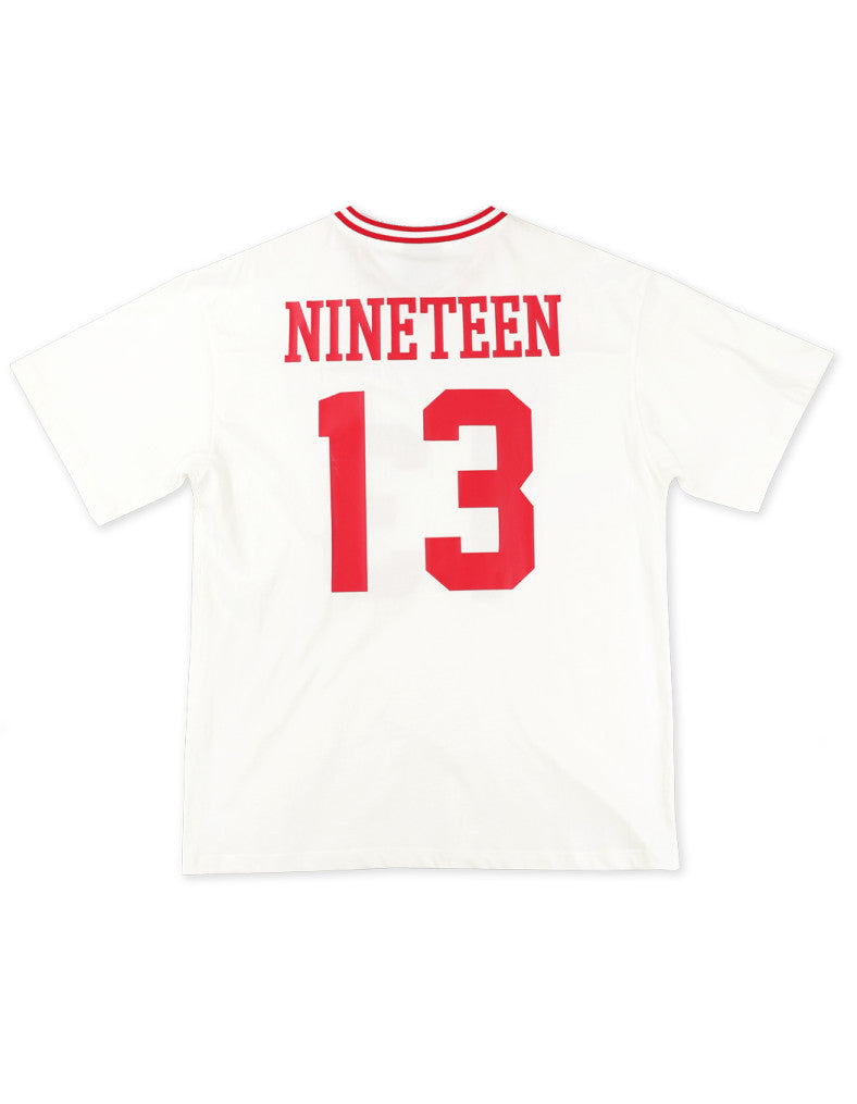 Back view of a white Delta Sigma Theta sorority jersey t-shirt featuring "NINETEEN 13" printed in red on the back, with red striped trim on the crew neck.