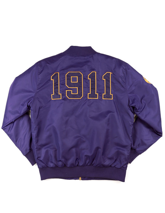 Back view of a purple Omega Psi Phi bomber jacket with the fraternity letters.