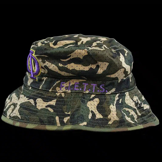 "Omega Psi Phi brotherhood gear: camouflage bucket hat with 1911 founding year and purple details."
