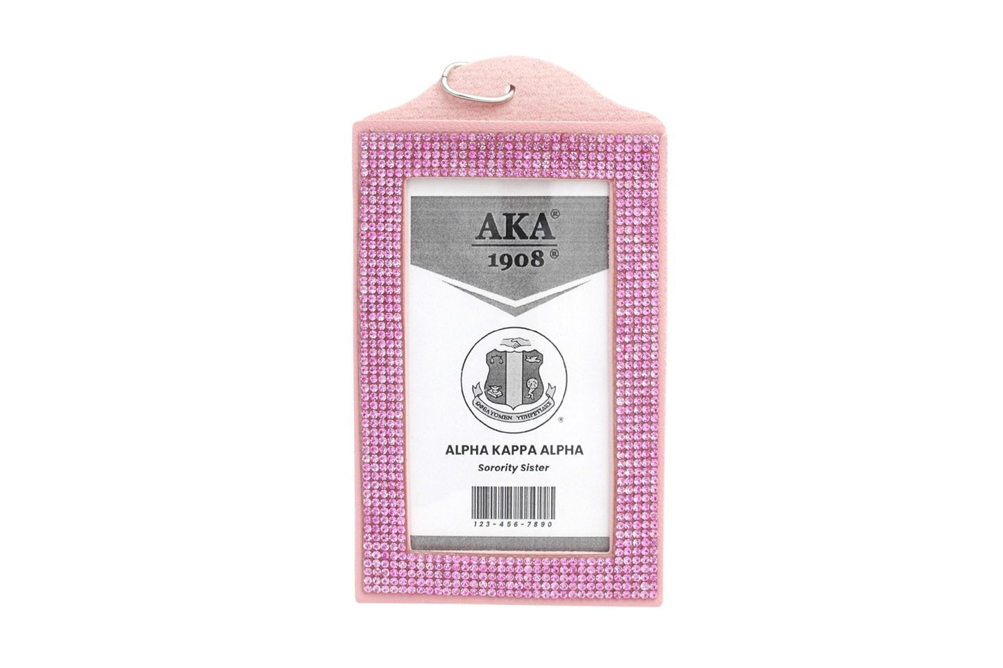 Pink rhinestone clutch with Alpha Kappa Alpha crest on a white background