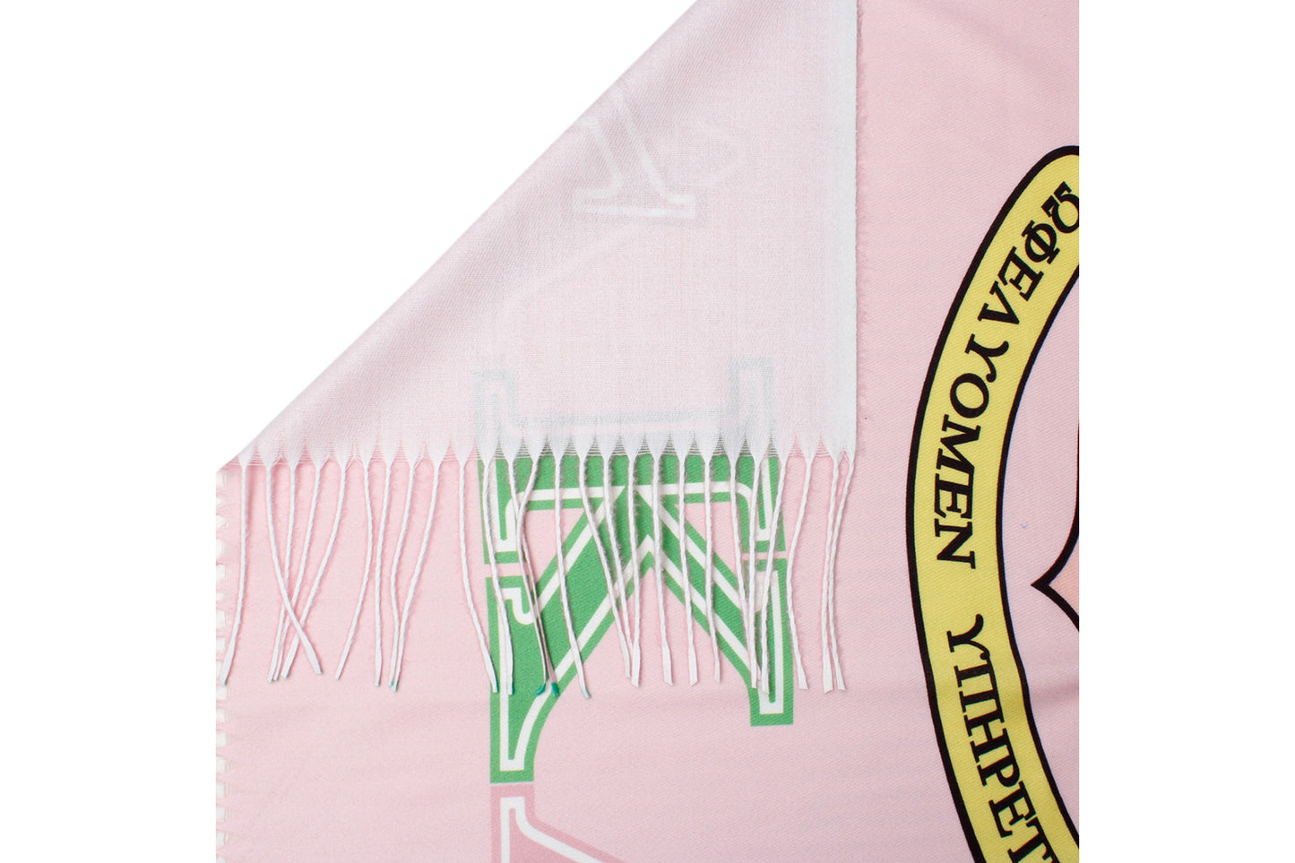 Pink scarf with green patterns and a logo on a white background. AKA