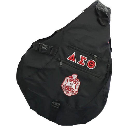 A Black Delta Sigma Theta sling bag with the sorority's emblem and letters printed on the front.