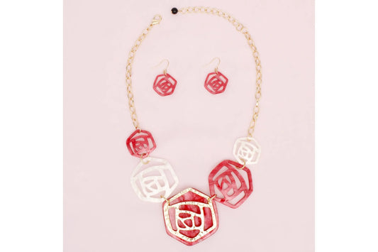 Close-up of DST marbled acrylic rose collar necklace, showcasing hammered gold center detail"