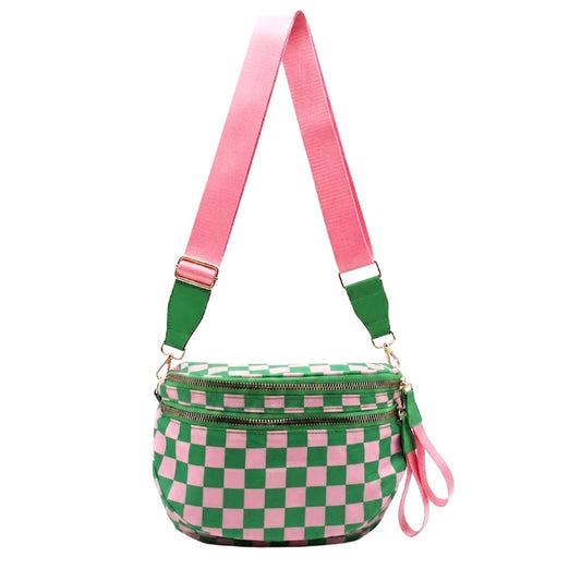 Green and pink checkered bag with a pink strap on a white background