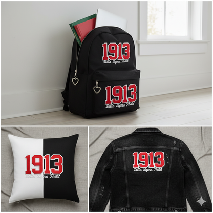  "Black backpack, black and white split pillow, and black denim jacket featuring the official Delta Sigma Theta 1913 founding year and sorority name embroidered patch. Ideal DST Greek paraphernalia."