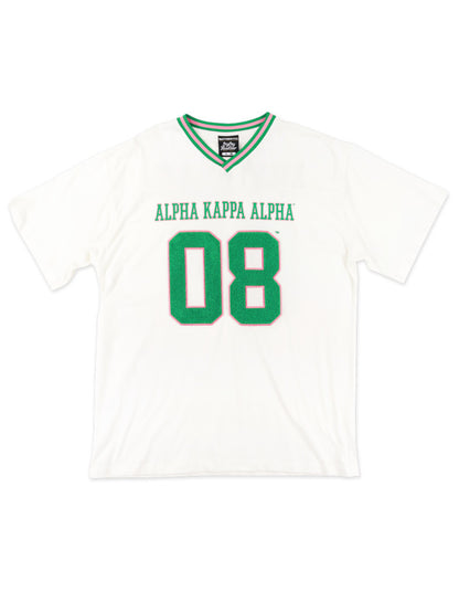 Front view of AKA Loose-Fit Jersey Tee in Ivory with embroidered Alpha Kappa Alpha and green chenille "08" numbers