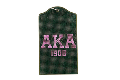 Official AKA Sorority pink and green rhinestone ID badge holder with 1908 Greek letters on vegan leather, sparkling under light"