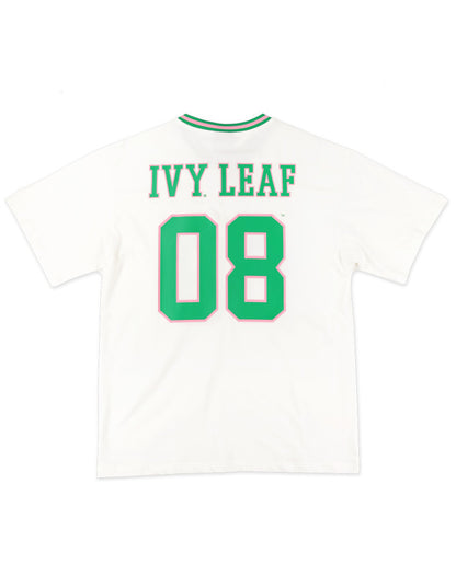 Close-up of green chenille "08" numbers with pink outlines on the AKA  Jersey Tee