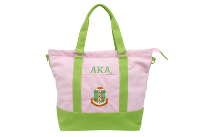 "Pink AKA sorority tote bag with embroidered Greek letters and green trim canvas"