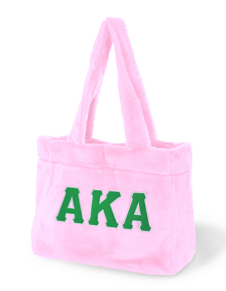 A vibrant pink tote bag with the Alpha Kappa Alpha sorority letters, perfect for showing your sorority pride.