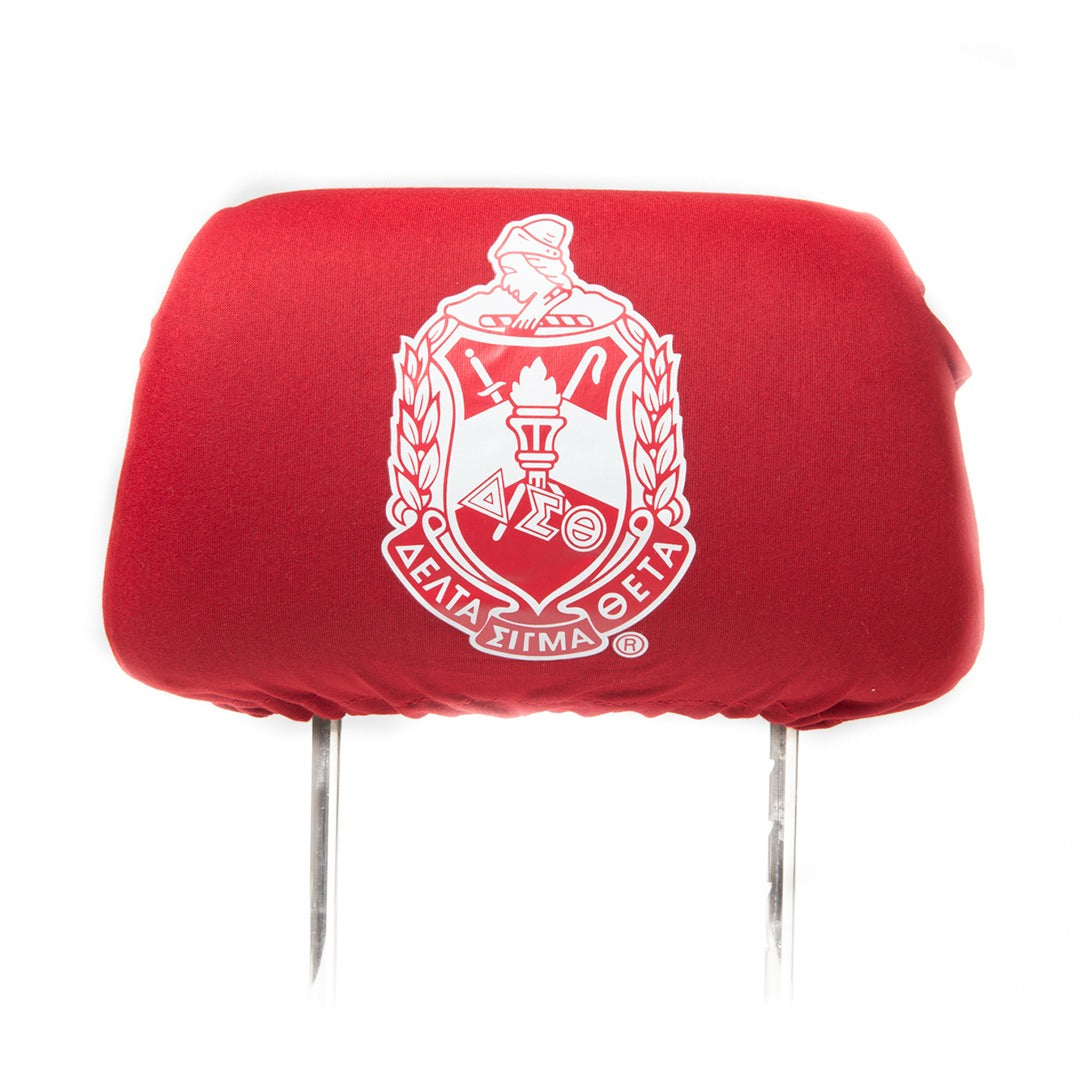 Official Delta Sigma Theta sorority red car headrest cover with red and white shield crest.