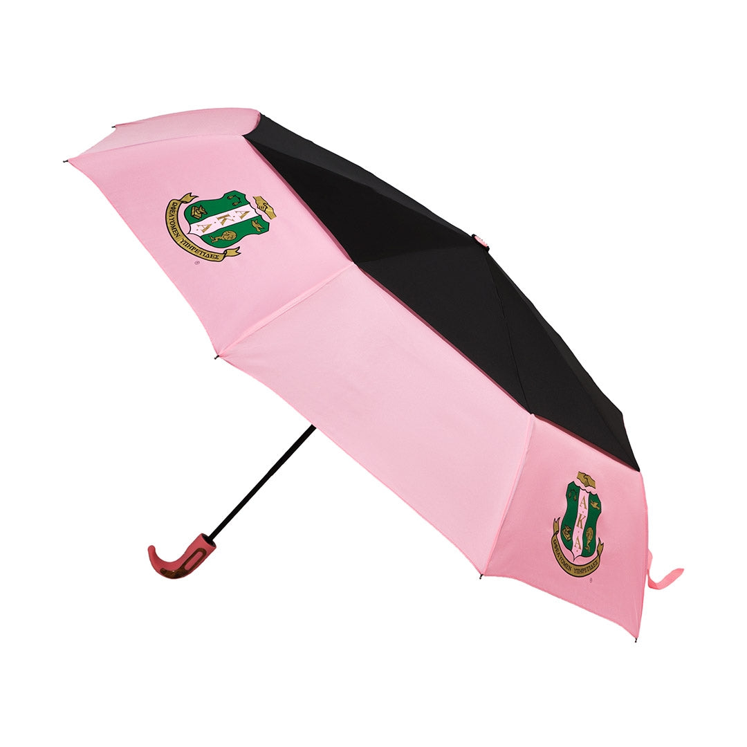 "Windproof AKA umbrella with sorority letters and crest, auto open/close function, and 28-inch travel-ready design." 