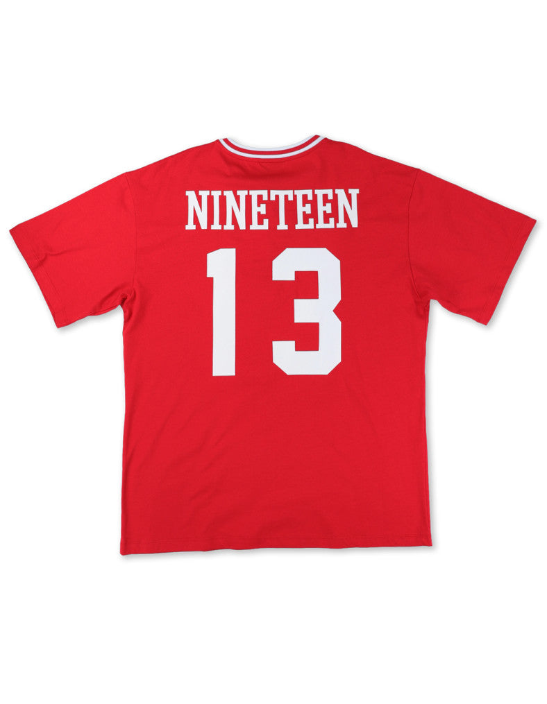 Red t-shirt with 'NINETEEN' and '13' printed on a white background